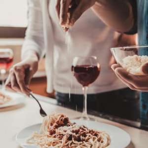 Cooking together on an Italy culinary vacation.