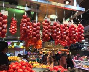 Tomatoes at the market on our culinary vacations in Spain.