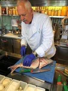 Blog writer David Sharos, a freelance writer for the Chicago Tribune, filets fish at Don Alfonso during a 3-day Amalfi Coast cooking vacation he and his wife attended in September of 2019.