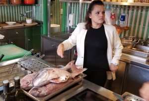 Selecting fish for the hands-on cooking class.