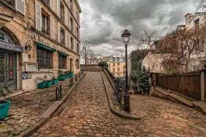 Visiting medieval Montmartre on a Paris food tour and Paris wine tour.