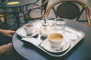 Enjoying a cappuccino and a caffe macchiato in Italy.