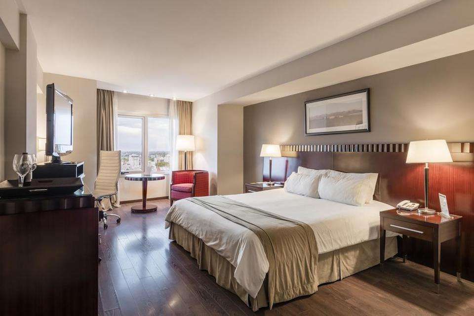 Image for Bedroom at the Diplomatic Hotel, home for your Mendoza wine tour.