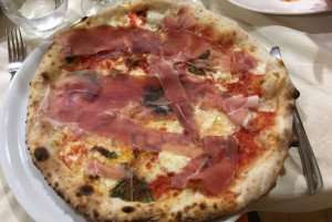 Pizza with prosciutto on an Amalfi Coast food tour.
