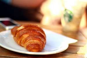 A flaky croissant on a cooking vacation in France.