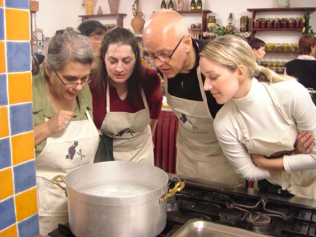 Watching the pot during an authentic cooking vacation with The International Kitchen.