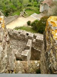 Exploring the castle ruins in Pombal on a culinary tour of Portugal.