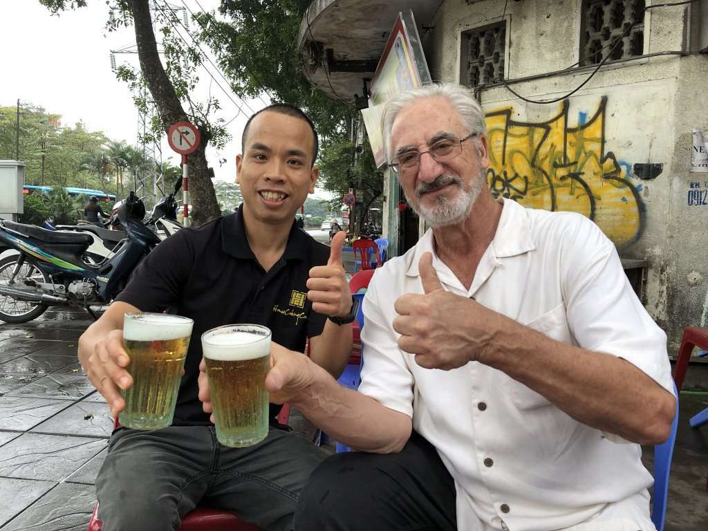 Enjoying a beer during a culinary vacation in Southeast Asia with The International Kitchen.