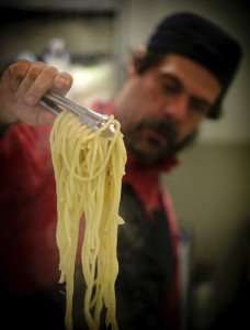 Preparing pasta on our Living the Real Tuscan Dream Tuscany cooking vacation.
