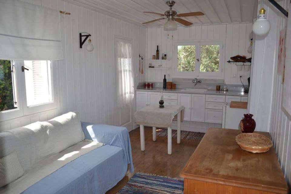 Image for Living area at the cottage for your Greece cooking vacation.