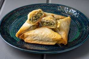 Greek spanakopita, or spinach pies, on a Greek cooking vacation with The International Kitchen.