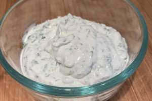 Yogurt sauce with garlic and fresh herbs.