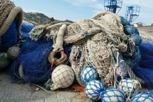 Fishing equipment on shore in a Spanish fishing village.