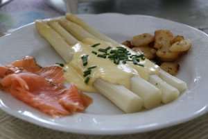 Asparagus with hollandaise sauce, a classic combination.