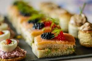 Close up of different types of holiday appetizers and canapes.
