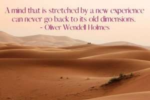 Travel quote by Oliver Wendell Holmes over a picture of the desert.