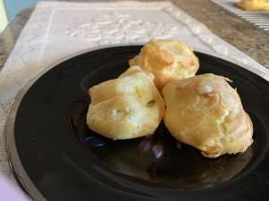 Close up of tasty gougeres, or savory pate a choux pastries, made during a cooking class in France.
