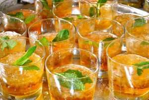 A tray full of mint juleps.
