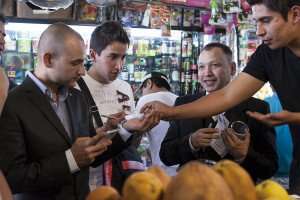 Tasting local fruits during a Mexico City food tour at the market.