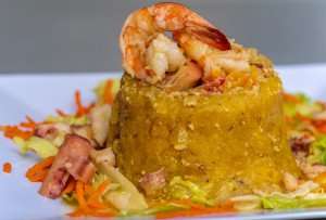 Eating shrimp mofongo during a Puerto Rico food tour.