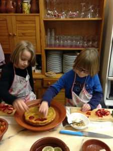 Kids enjoying a cooking class in Evora, Portugal.