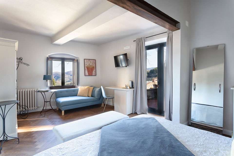 Image for View of a bedroom at the luxury Tuscan villa in the Chianti.
