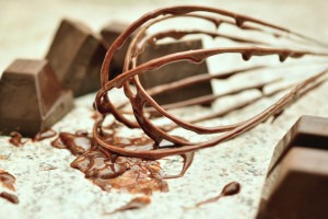 Melted chocolate on a whisk.