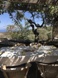 Dining outside during your Greek cooking vacation.