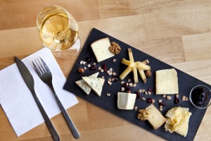 Cheese and a glass of AOC wine on our French food and wine tours.