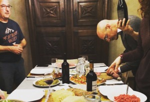 Enjoying a dinner party with friends during your authentic Italian cooking vacation in Piedmont.