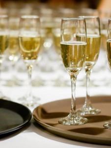 A tray of champagne glasses ready for a champagne toast.