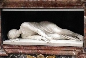 The statue of Saint Cecilia in her basiilca in Rome. 