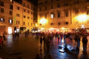 The piazza of Santa Maria in Trastevere at night. 