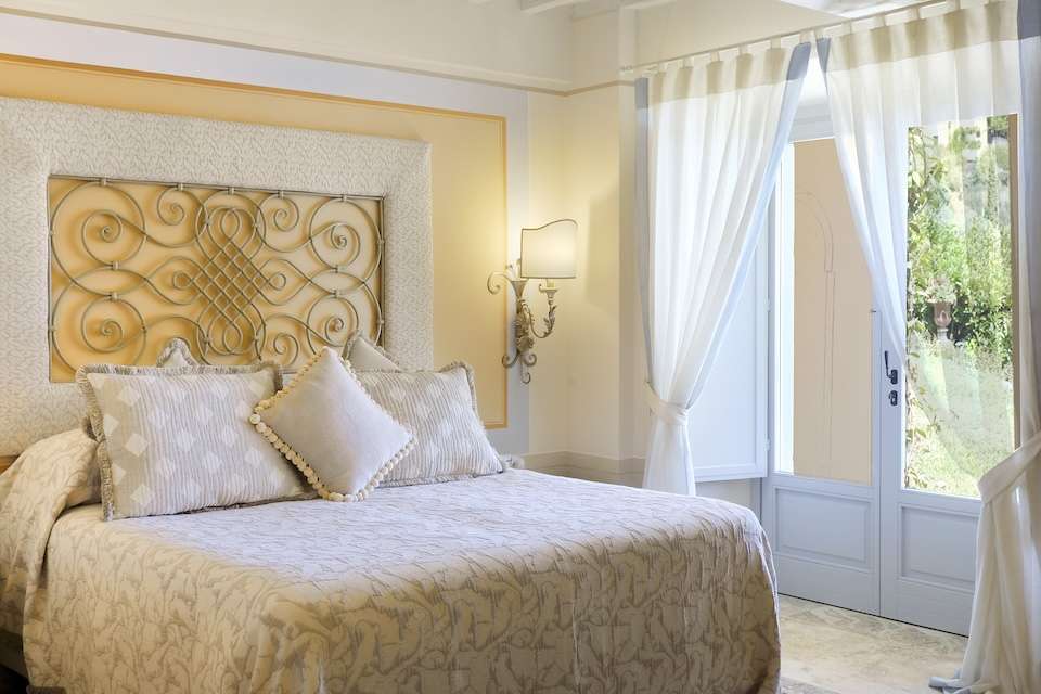Image for Deluxe room at the villa Scuderia on the Falconiere estate.