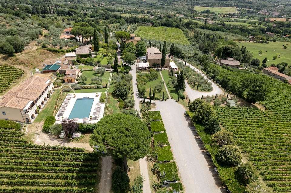 Image for A view the estate with the villa Scuderia on the left and the historical villa straight ahead.