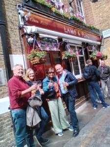 Enjoying a day at the pub during your London food tour.