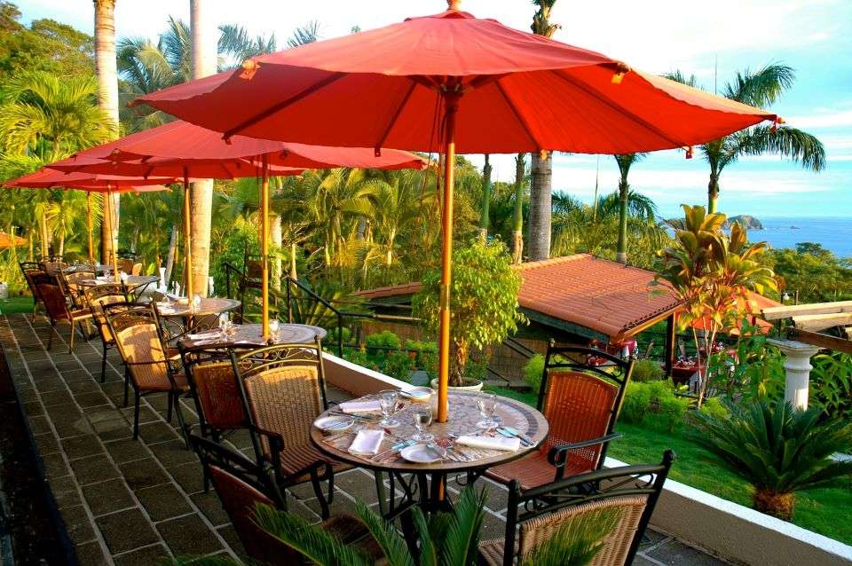 Image for Enjoy a meal on the terrace at the Parador Hotel.
