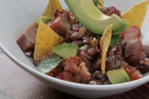 Chifrijo eaten during your culinary vacation