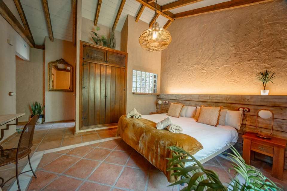Image for Bedroom at the Cueva del Gato eco hotel.