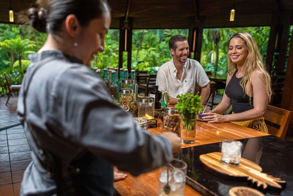 Image for Drinking at the bar at Tabacon Resort and Spa.