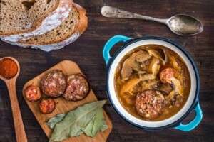 Traditional Sour Cabbage Soup with Sausage and Mushrooms