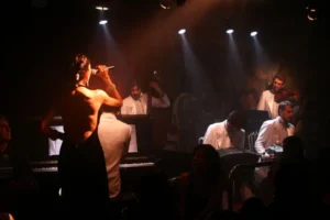 Singer performing during Tango experience.