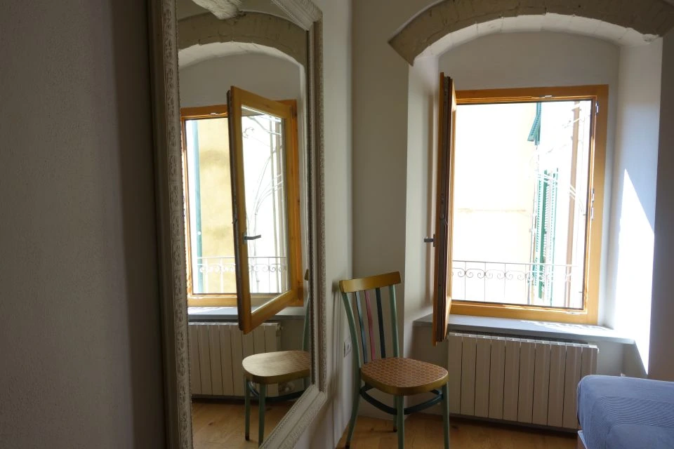 Image for Large windows are a prominent feature at this bed and breakfast.