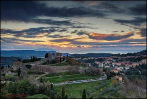 The sun sets over the bustling townstead.