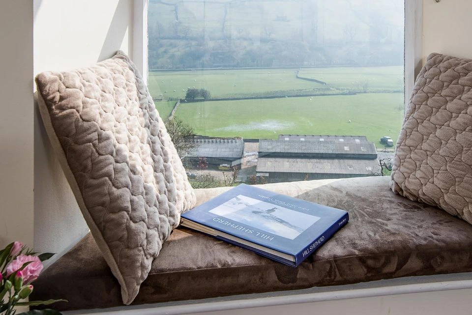 Image for Enjoy cozy reading nooks and astonishing views.