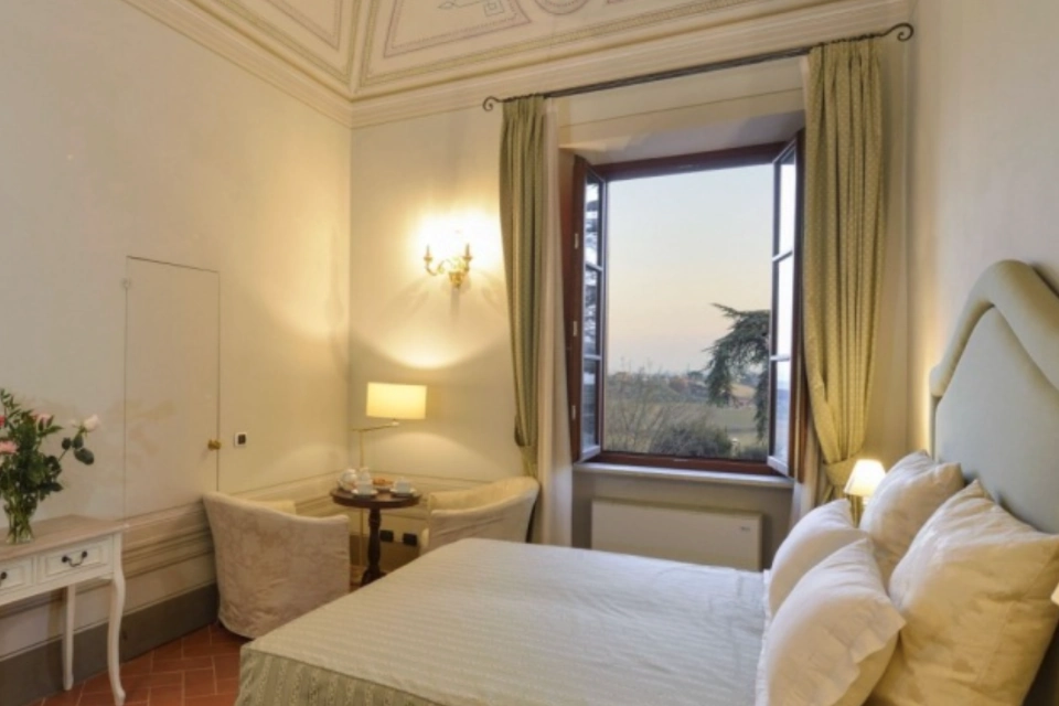 Image for Another delightful room option at the villa. Image © Tenuta Villa Rocchi