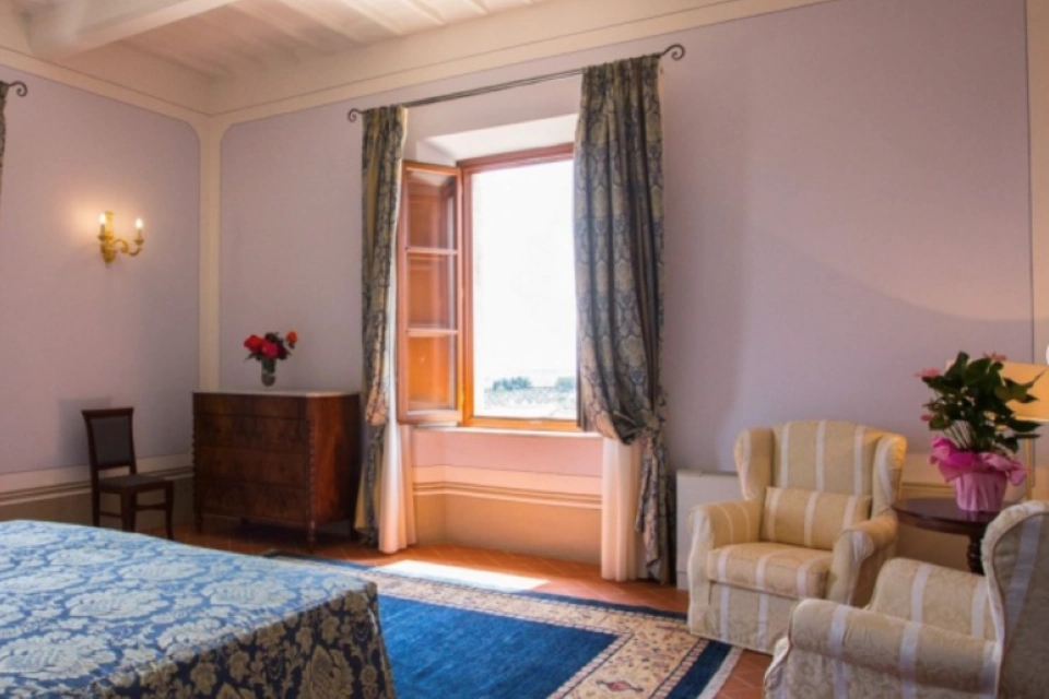 Image for Each room has plenty of places to sit. Image © Tenuta Villa Rocchi