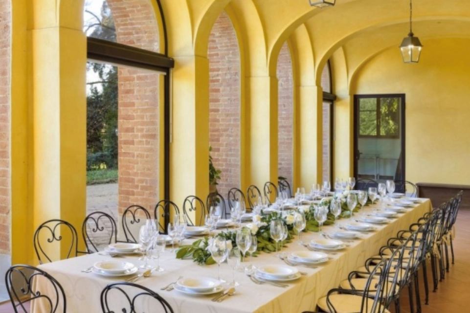 Image for Group dining area at the villa. Image © Tenuta Villa Rocchi